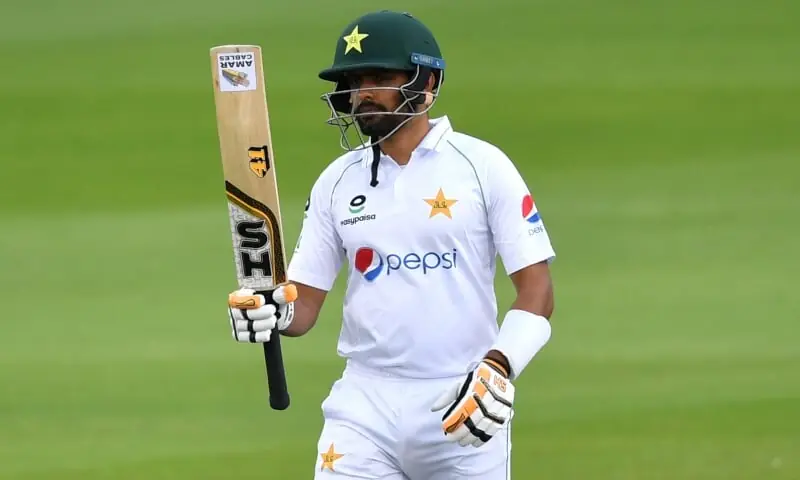 In this file photo, Babar Azam reaches 50 runs during the first day of the first Test match between England and Pakistan at Old Trafford in Manchester, northwest England on August 5, 2020. — AFP/File