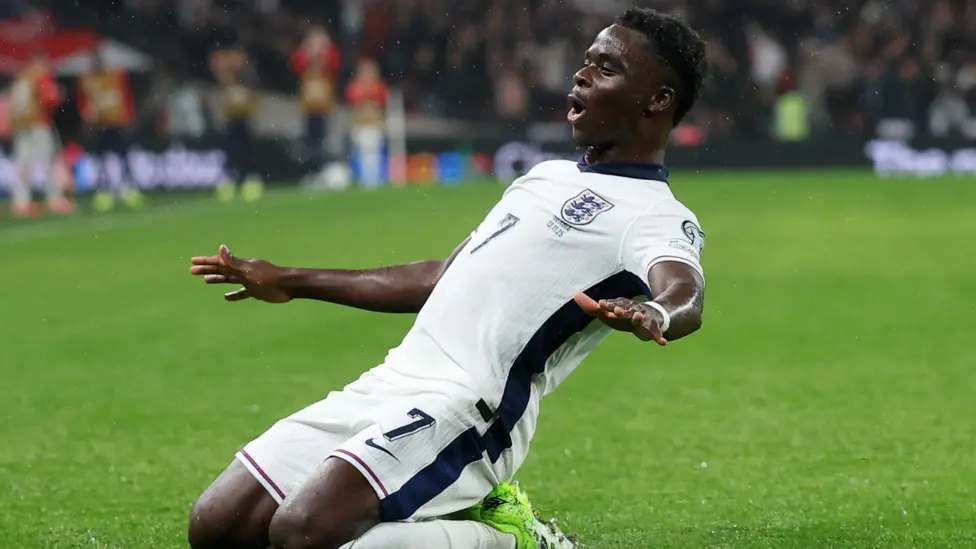 Bukayo Saka celebrates after putting England ahead in the World Cup qualifier against Serbia