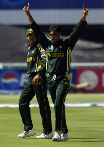 Fast bowler celebrating a wicket.
