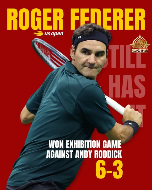Federer executing a backhand during his singles match against Roddick.
