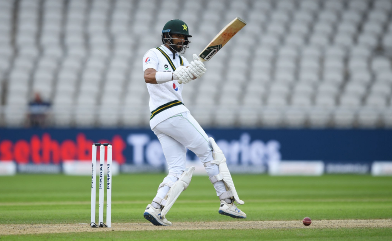 Shan Masood was trapped LBW by Robinson for 5.