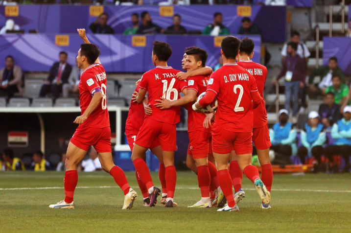 Vietnam players celebrate their second-half lead.