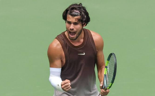 Alcaraz celebrating a key point at Arthur Ashe Stadium