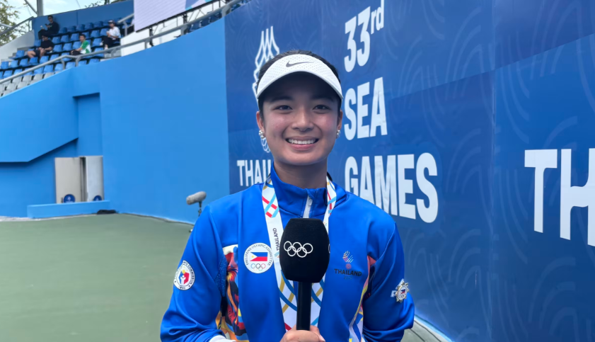 Alexandra Eala holding her medal after representing the Philippines.
