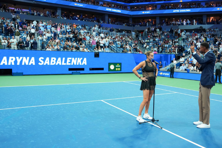 Aryna Sabalenka addressing the crowd following her 53-minute second-round victory.