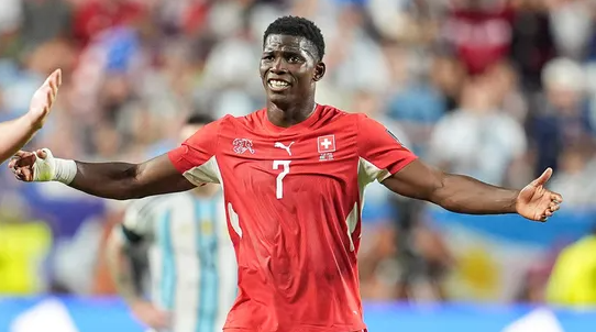 Swiss international forward Breel Embolo stepped up and calmly slotted the 87th-minute penalty past the keeper to secure a hard-fought 2-2 draw for the visitors.
