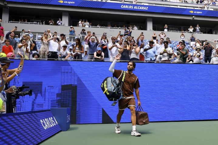 Carlos Alcaraz preparing for second-round action at Arthur Ashe Stadium.
