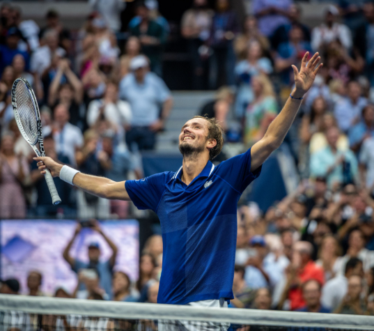 Daniil Medvedev celebrates first round victory.