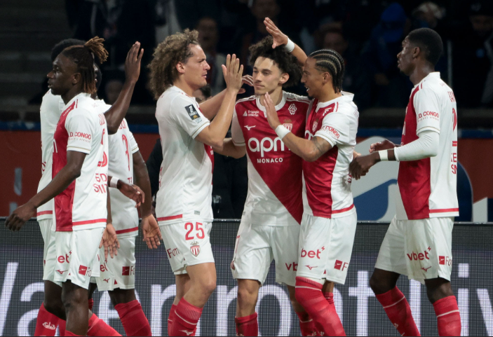 Monaco players celebrate Stanis Idumbo's second-half winner.