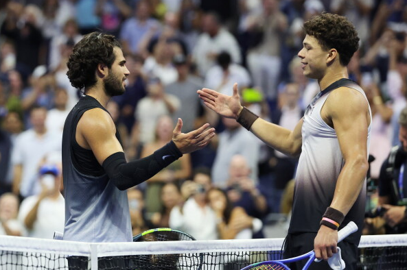 Mutual respect following a grueling 5-set quarter-final battle.