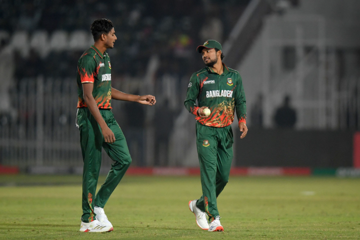 Nahid Rana in discussion on the field during an international fixture.