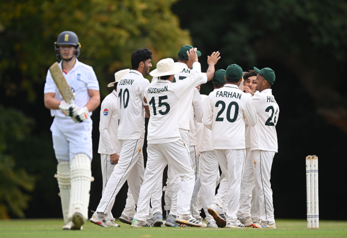 Pakistan U19 team celebrating an early breakthrough.